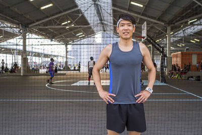 Male athlete warms up for workout in brooklyn bridge park