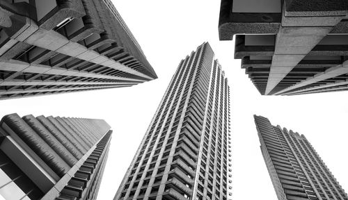 Low angle view of modern buildings against clear sky