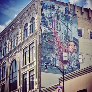 Woman on building in city