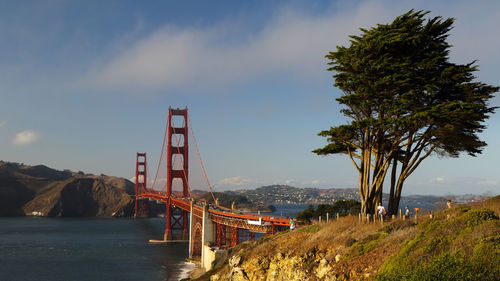 Bridge over sea against sky