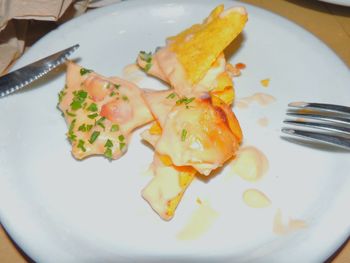 Close-up of nachos served in plate on table