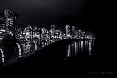 Bridge over river at night