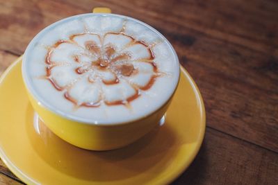 Close-up of cappuccino on table