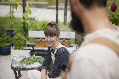 Portrait of smiling friends having food