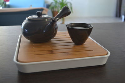 Close-up of tea cup on table