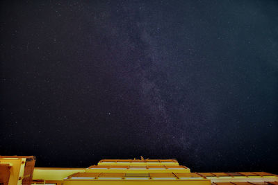 Low angle view of building against sky at night