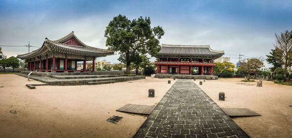 Temple against cloudy sky