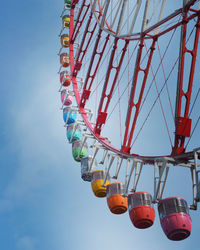 Low angle view of ferris wheel in tokyo