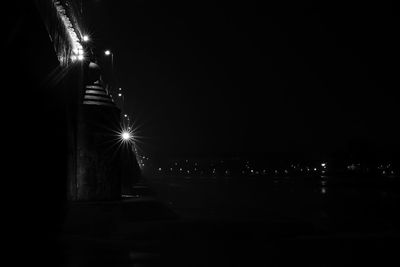 Illuminated street light at night