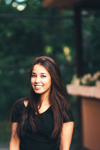 Portrait of smiling young woman