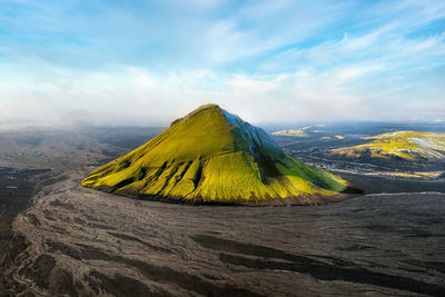 Scenic view of volcanic landscape against sky