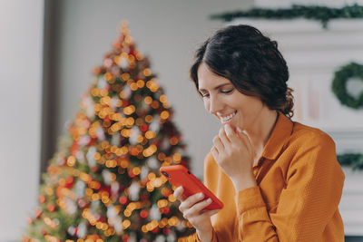 Young woman using mobile phone