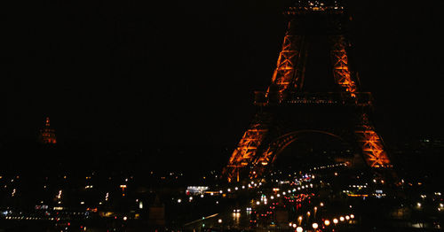 Illuminated buildings in city at night