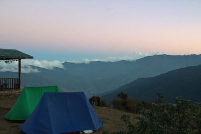 Scenic view of mountains against sky during sunset