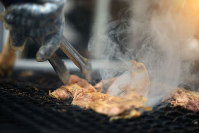 Close-up of meat on barbecue grill