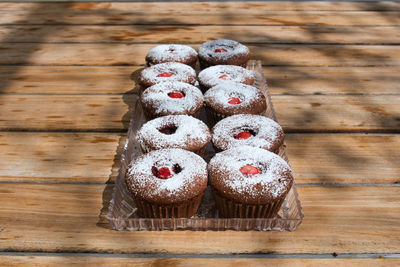 Directly above shot of cupcakes on table