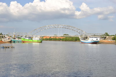 View of bridge over river against sky