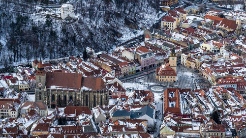 High angle view of houses in city during winter