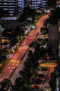High angle view of illuminated city street at night
