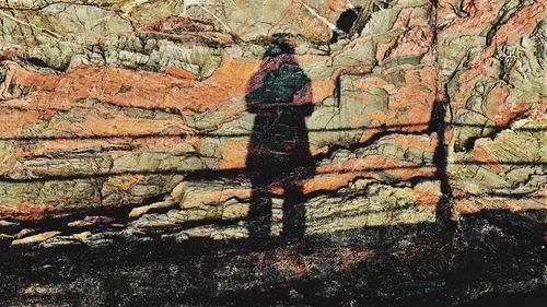 Woman standing on rock