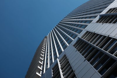 Low angle view of modern building against sky