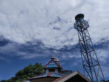 Low angle view of statue against sky