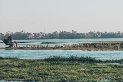 Scenic view of lake against clear sky