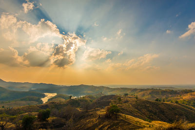 Scenic view of landscape against sky during sunset