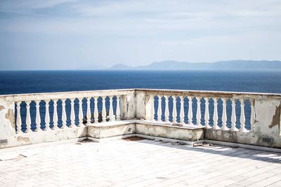 Scenic view of sea against sky from high terrace