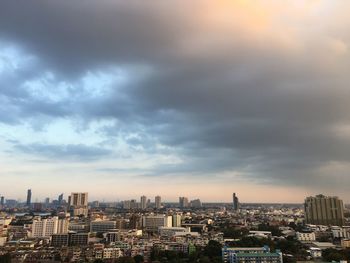 High angle view of buildings in city against sky