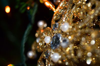 Close-up of illuminated christmas tree at night