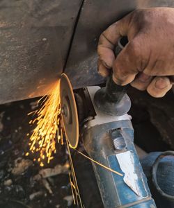 Man working on metal structure