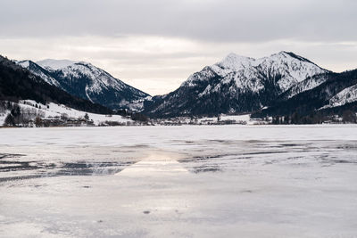 Scenic view of snowcapped mountains against sky