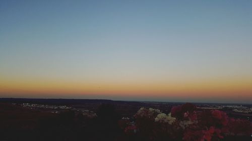 Aerial view of cityscape at sunset