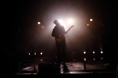 Man standing at music concert