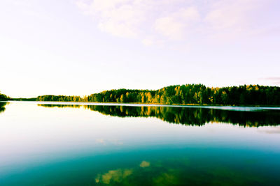 Reflection of clouds in calm lake