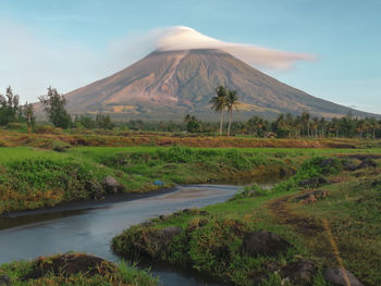 Scenic view of volcanic crater against sky