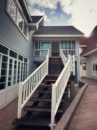 Staircase of building against sky