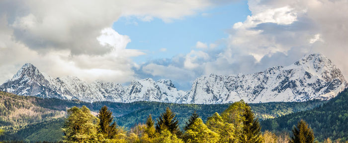 Panoramic view of landscape and mountains against sky