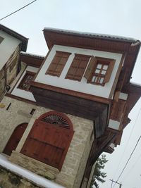 Low angle view of old building against sky