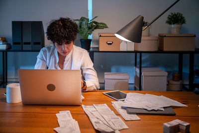 Man using laptop at office