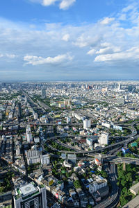 High angle view of buildings in city against sky