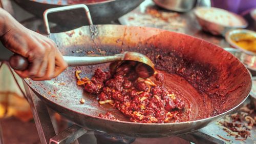 Close-up of person preparing food