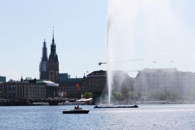 Boats sailing in river