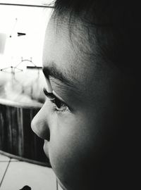 Close-up of child looking away