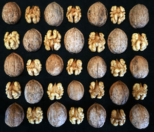 Full frame shot of walnut on black background