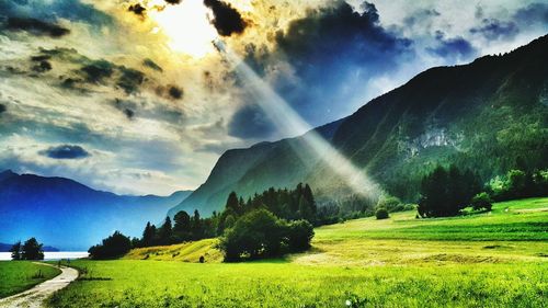 Scenic view of landscape against cloudy sky