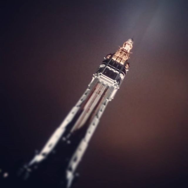 low angle view, tall - high, built structure, architecture, tower, building exterior, night, metal, clear sky, industry, tall, no people, outdoors, famous place, international landmark, copy space, travel destinations, communications tower, construction site, capital cities