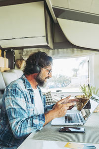 Portrait of man working at table