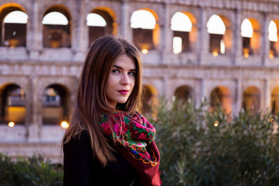 Portrait of beautiful woman at night